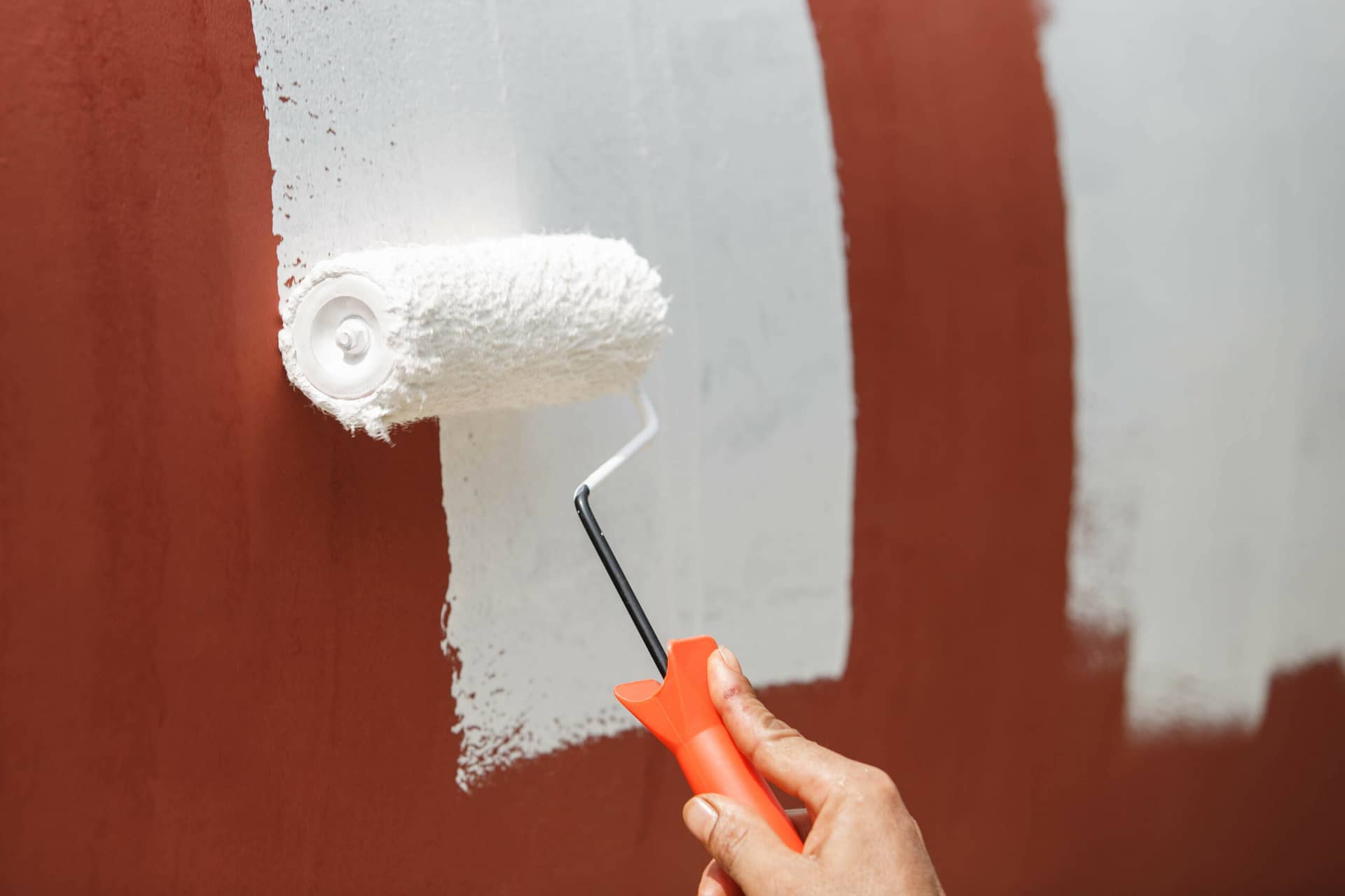 Applying primer to an interior wall
