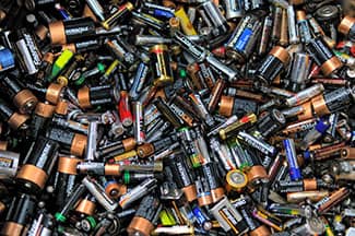 Pile of dead batteries ready for recycling
