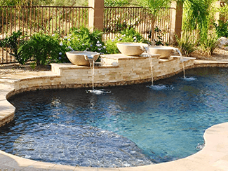 Beautiful pool with water features and fountains 