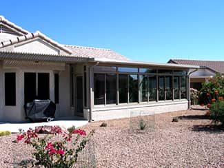 Outdoor porches can be screened or glassed in to provide a place that is outside yet protected from the weather.