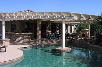 This patio cover provides shade for the patio as well as a portion of the pool. Now that is a win-win!