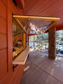 Awning windows accomplish the pass-through feature with style